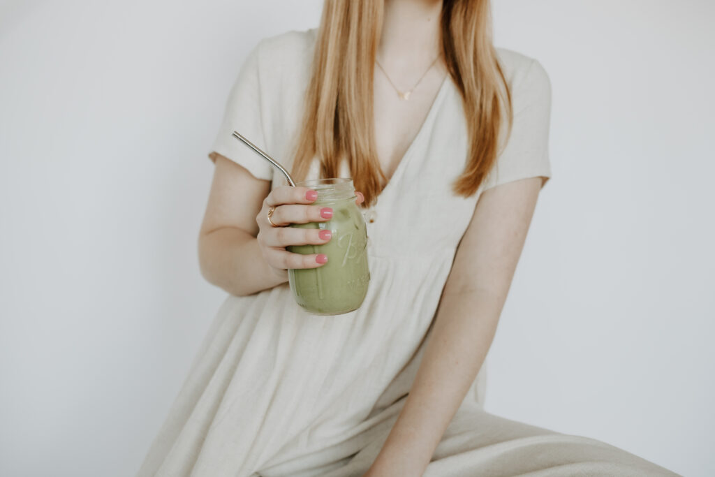 girl holding matcha for brand photos