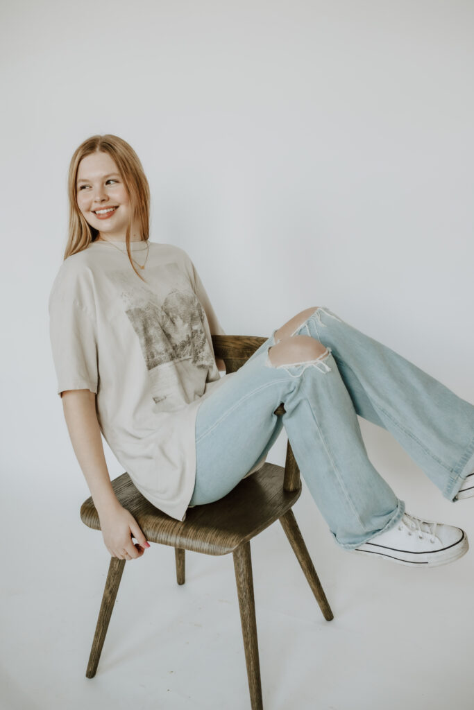 Pinterest manager sitting in a chair during brand photoshoot