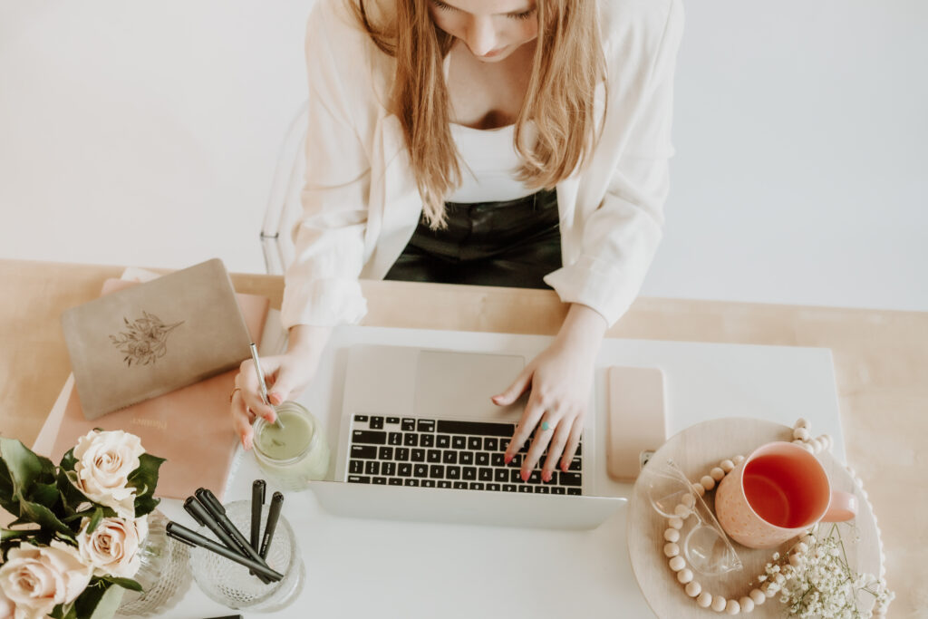 Pinterest manager working on her laptop